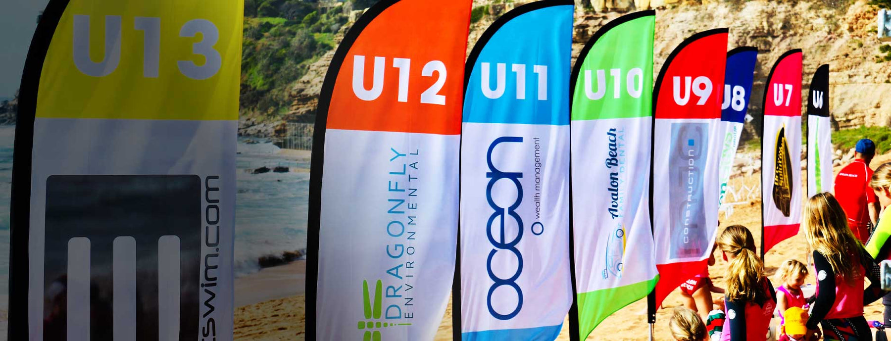 Custom flags and banners at an outdoor event